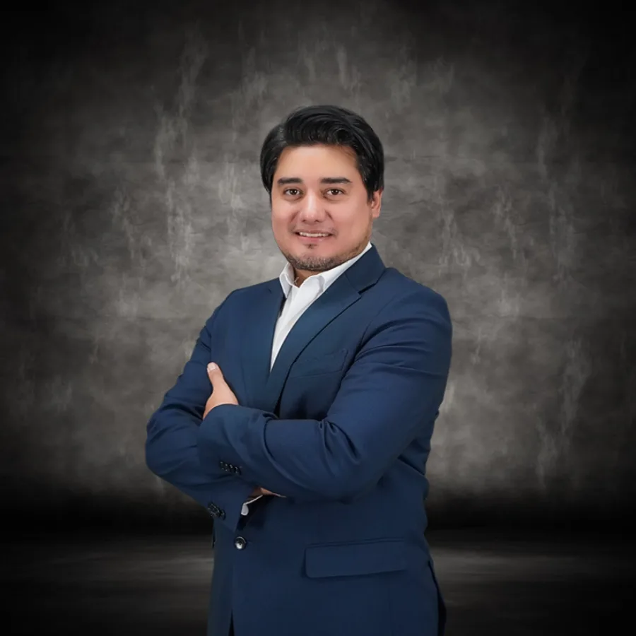Dr. Alfredo Chama Naranjo, board-certified plastic surgeon, professional studio portrait.
